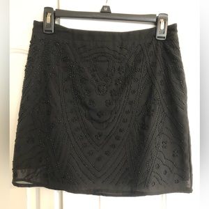 Black beaded mini skirt